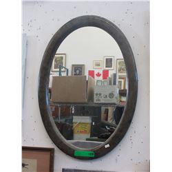 Used framed wall mirror