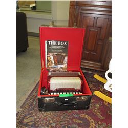 Small vintage accordion with case