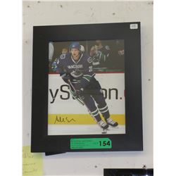 Autographed Alex Edler photograph