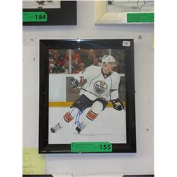 Autographed Taylor Hall photograph