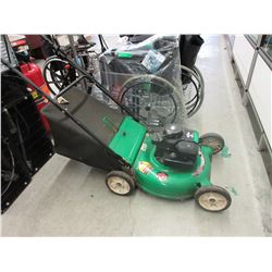 Used gas powered lawn mower with bag attachment