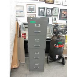 Used 4-drawer metal letter size filing cabinet