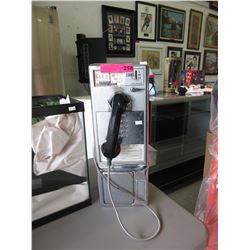 Used metal payphone