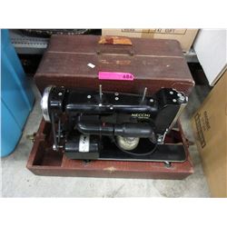 Vintage Necchi portable sewing machine with case