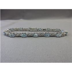 Blue Topaz & Diamond Tennis Bracelet