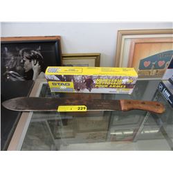 Used Parkes machete & stag gun cleaning kit