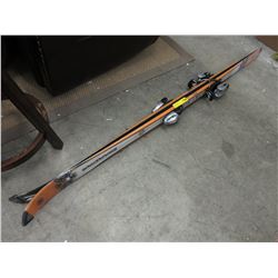 Pair of used Dynastar skis with bindings