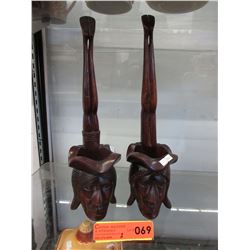 Pair of carved hardwood decorations