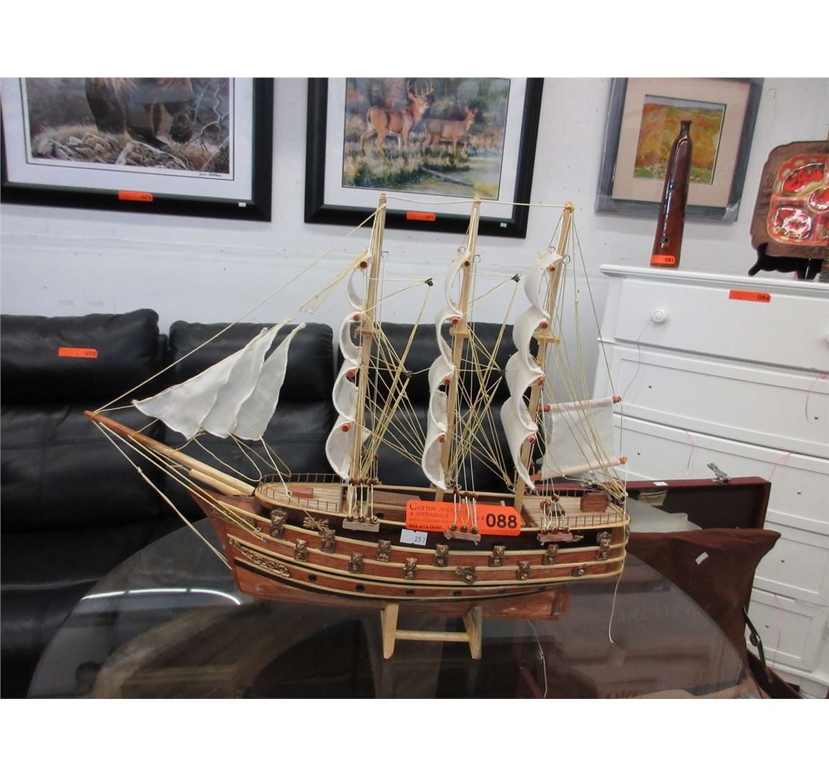 Wood ship model on stand