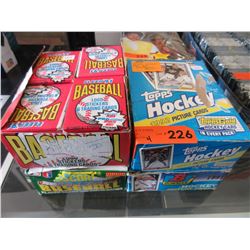 4 Boxes of New hockey & Baseball cards