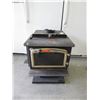 Image 1 : Used cast iron wood stove
