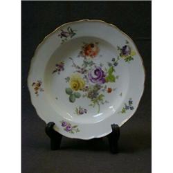 A CABINET PLATE, 19th Century, polychrome floral sprays, gilt rim, Meissen crossed swords mark to...