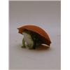 Image 1 : A TINTED BISQUE ANIMAL FIGURE, frog beneath an umbrella, height 6cm  30-40...