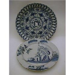 A TIN GLAZED EARTHENWARE CHARGER, blue and white Kraak design, probably French mid 18th Century, ...