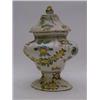 Image 1 : A TIN GLAZED EARTHENWARE URN AND COVER, of bombe form, polychrome floral decoration, dated '1742'...