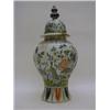 Image 1 : A TIN GLAZED EARTHENWARE BALUSTER JAR AND COVER, polychrome floral and insect decoration, height ...