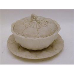 A PARIAN WARE BUTTER DISH, cover and stand, c.1870, moulded with cockle shells, diameter 17cm (s....