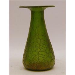 A GREEN IRIDESCENT GLASS VASE, early 20th Century, attributed to Loetz, protruding rim, tapered c...