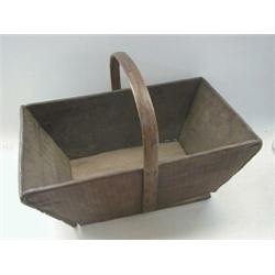 A TREEN BASKET, loop handle, of naive construction  20-30...