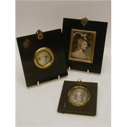 A SERIES OF THREE JAPANNED PORTRAIT MINIATURE FRAMES, containing printed portraits after Reynolds...