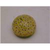 Image 1 : A MILLEFIORE GLASS PAPERWEIGHT, primrose and claret florets on a green ground, height 6cm, diamet...