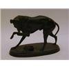 Image 1 : A BRONZED GREYHOUND FIGURE, 19th Century, bandaged foreleg, on oval plinth, height 12cm  30-50...