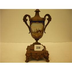 Sevres style ormolu mounted ewer with goat head handles, having cottage scene on blue ground…