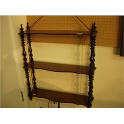 Late 19c mahogany hanging wallshelves with ebony turnings and original cord hanger…