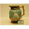 Image 1 : Superb Majolica jug embossed with cranes, having bamboo style handle and borders…