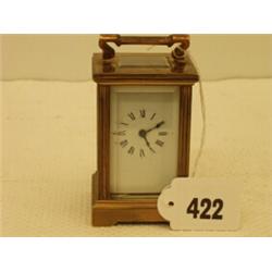 Early 20c small brass carriage clock with bevelled glass sides and French movement, working order…