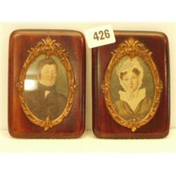 Pair of handpainted 19c miniature portraits in rectangular frames with ormolu oval centres…