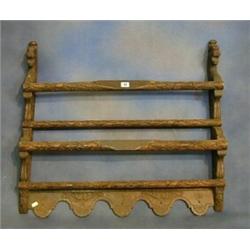 A Victorian carved oak 2 tier plate rack 33" £100-150...