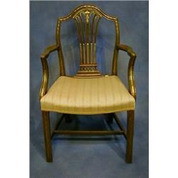 A 19th Century green and gilt painted Hepplewhite style camel back chair with upholstered seat on...