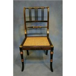 A set of 4 fine quality 19th Century black lacquered stick and rail back dining chairs with woven...