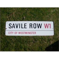 An enamelled City of Westminster street sign "Savile Row W1" £500-700...