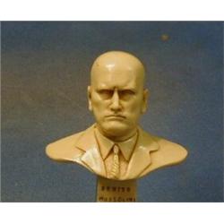 A resin head and shoulders portrait bust of Mussolini, 6" £10-20...