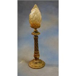 A carved wooden spiral turned table lamp with glass torch shade £70-90...