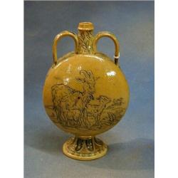A Doulton Lambeth Hannah Barlow twin handled moon shaped flask decorated goats, the base impresse...