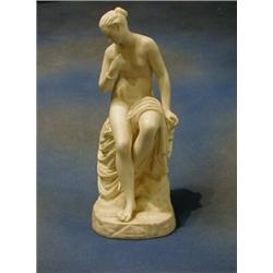 A 19th Century Parian figure of a seated Andromeda 13" £180-220...
