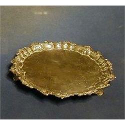 A William IV silver salver with bracketed border and engraved armorial decoration London 1831, 8"...