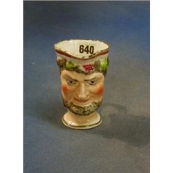 A 19th Century Staffordshire Toby jug in the form of Bacchus 4" £30-50...