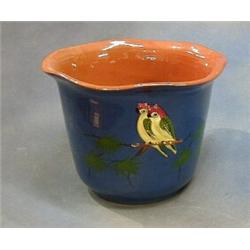 A  circular Royal Torquay pottery jardiniere decorated parrots 9" £20-30...