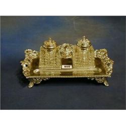 A  19th Century silver plated twin bottle inkwell fitted 2 cut glass ink wells £225-275...