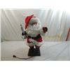 Image 1 : VINTAGE MOVEABLE SANTA DOLL