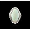 Image 1 : 14KT White Gold 12.47ct Opal and Diamond Ring