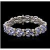 Image 1 : 14KT White Gold 31.20ctw Tanzanite and Diamond Bracelet