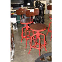 PAIR OF INDUSTRIAL MODERN BAR STOOLS - RED AND NATURAL WOOD