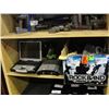 Image 1 : SHELF LOT OF ASSORTED ELECTRONICS; PRECISION POWER CAR AMP, KAWASAKI CORDLESS DRILL, PANSONIC TUFF