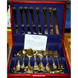 63 PCS GOLD COLORED FLATWARE IN WOOD CASE