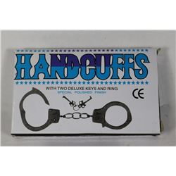 PAIR OF NEW HANDCUFFS X4